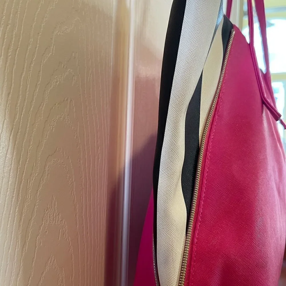 Juicy Couture hot pink & black &white tripes tote.